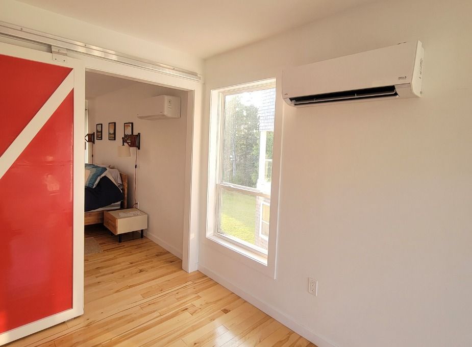Heat pump above a dining area